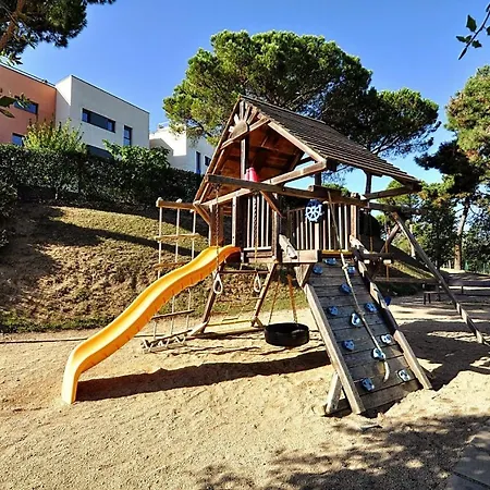 Pretty Garden Next To A Charming *