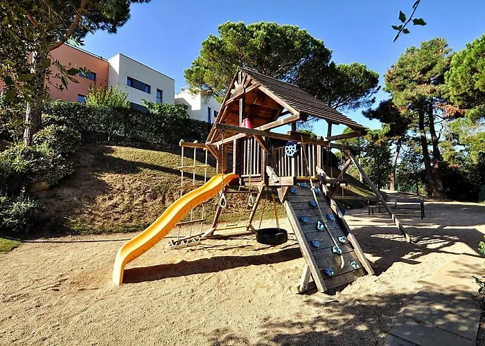 Pretty Garden Next To A Charming *